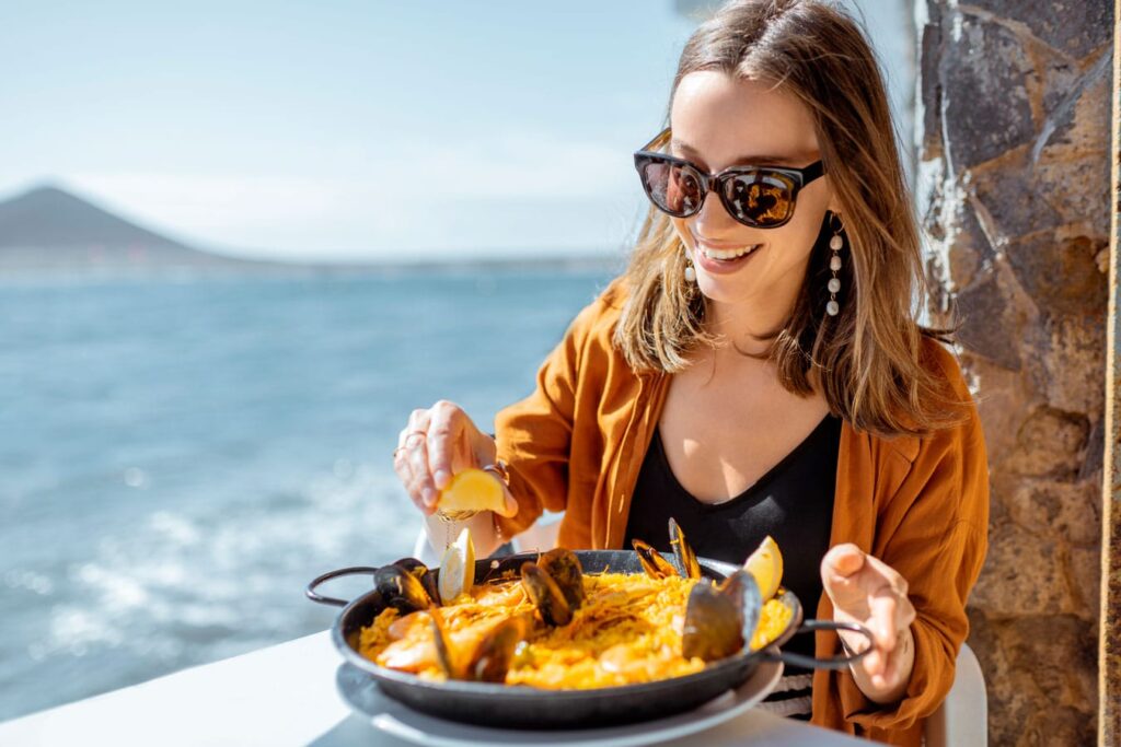 Enjoying a tasty seafood paella.